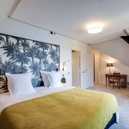 فندق لو بالاس دو مونتو منتون - سانت - برنارد المظهر الخارجي الصورة A room at the hotel